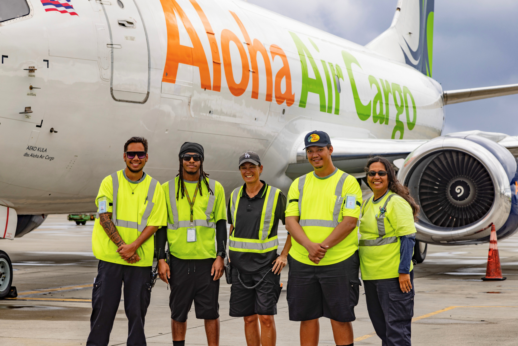 Photo of two Aloha Air Cargo pilots sitting in the cockpit of a plane.